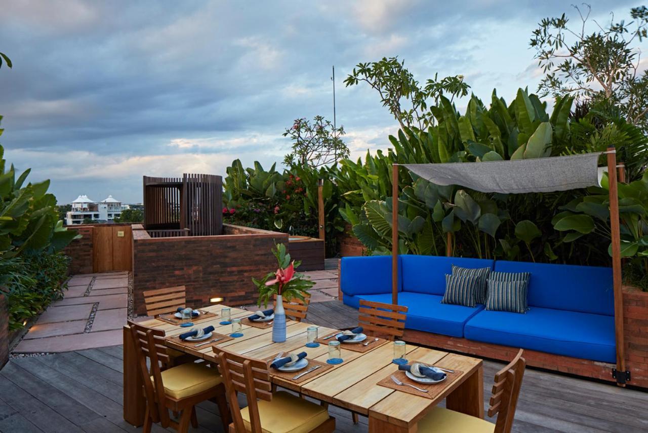 סמיניאק Potato Head Suites & Studios מראה חיצוני תמונה The rooftop bar at the hotel