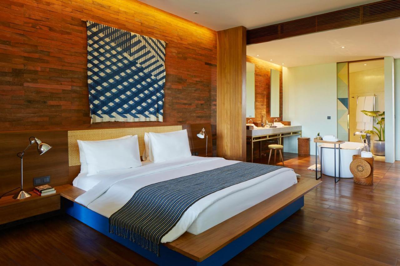 סמיניאק Potato Head Suites & Studios מראה חיצוני תמונה A bedroom at the hotel